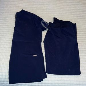 FIGS Scrubs. Color navy. Small Casma top. Medium Cade Cargo pants.